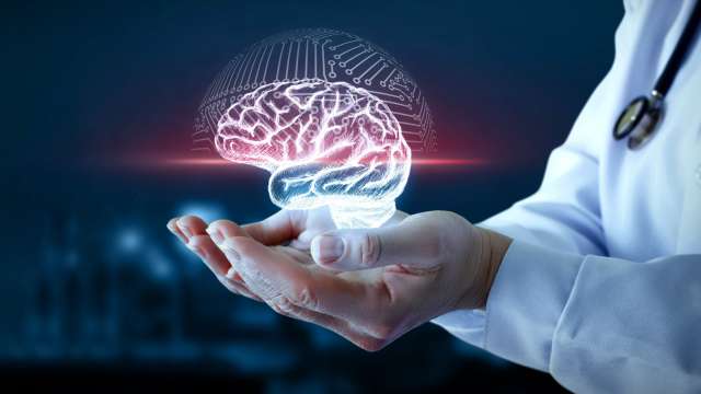 Doctor holding a virtual brain scan