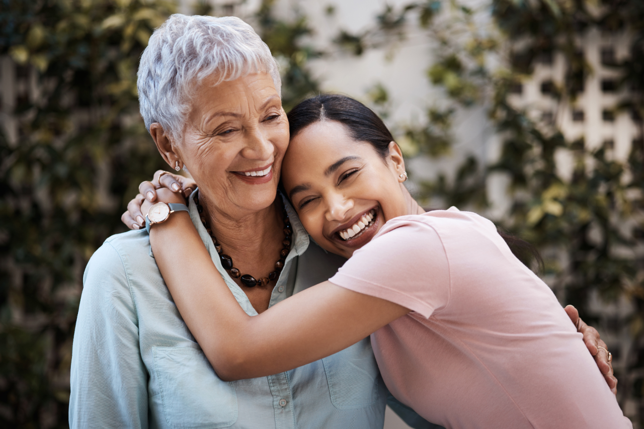A Mother and Daughter Hugging in a Supportive Way